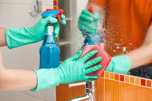 Careful exterior building cleaning near busy W1T streets